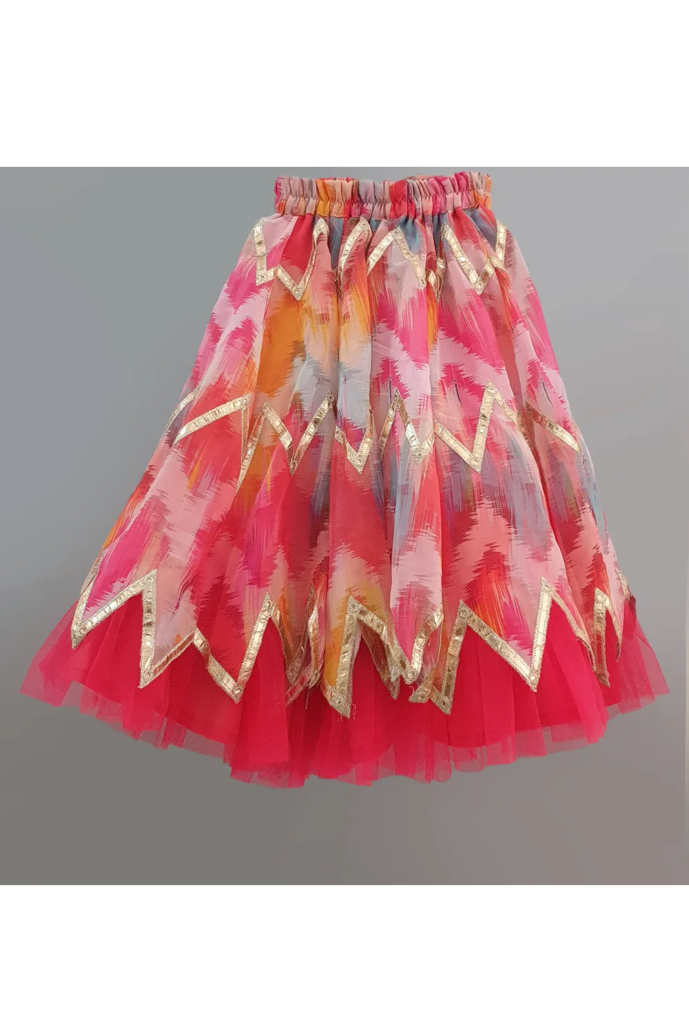 Hot pink choli and pink tie dye lehenga with dupatta