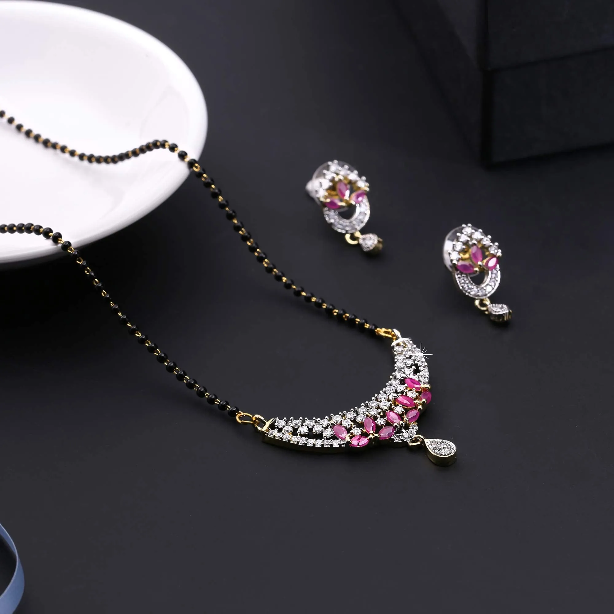 Yellow Chimes Classic Pink AD/American Diamond Studded Ethnic Black Beads Designer Mangalsutra Set with Earrings for Women